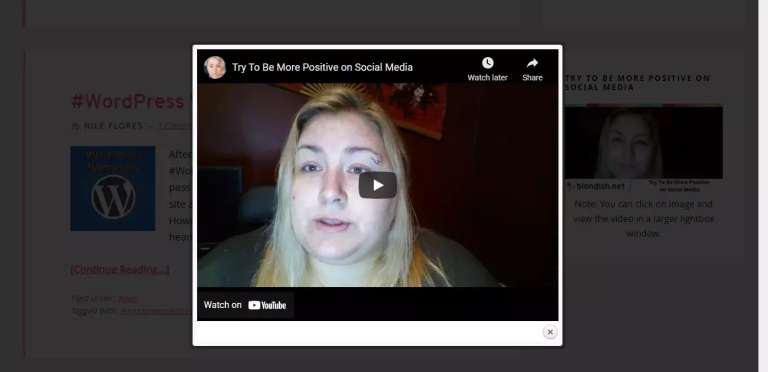 YouTube video opens in a lightbox window